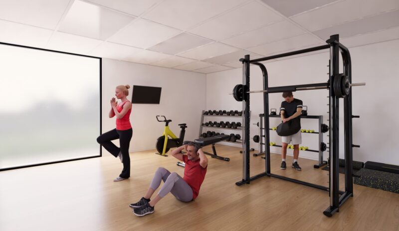 Functional workplace gym and rehabilitation area within an onsite HealthHub facility