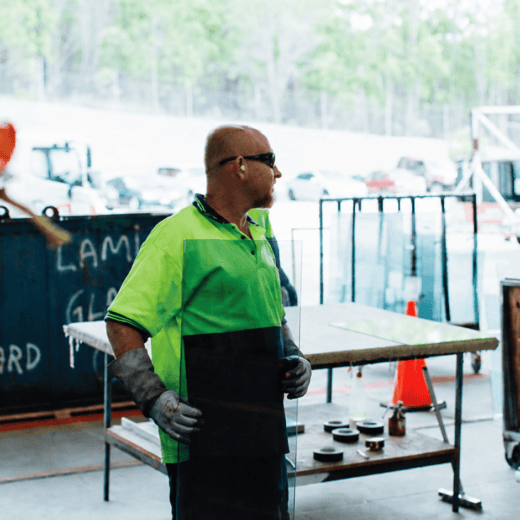 Return to work program planning meeting between an industrial worker and workplace supervisor.